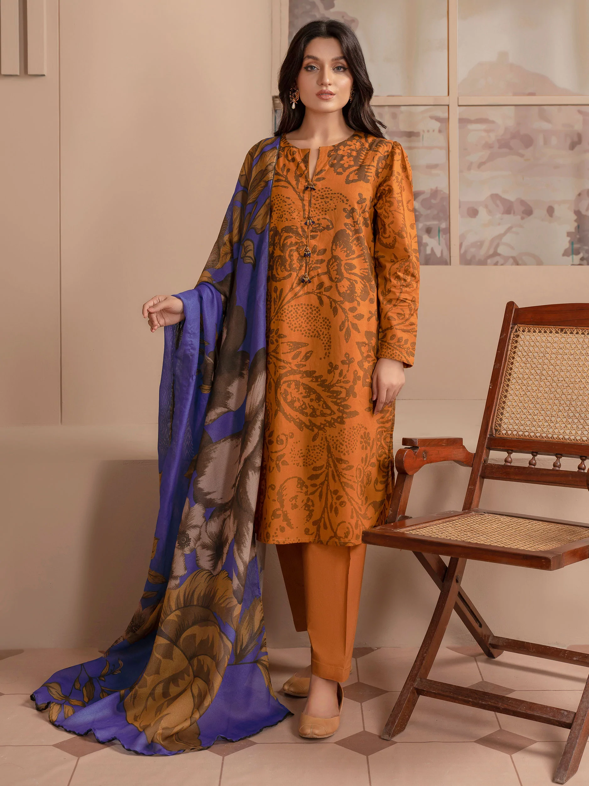 Unstitched 3 Piece Printed Cambric Mustard Suit