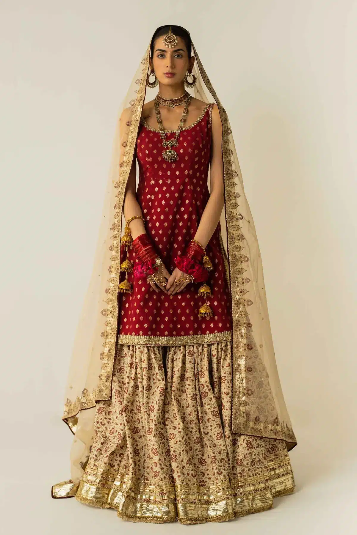 Zara Shahjahan Golden and red color printed gharara bridal dress