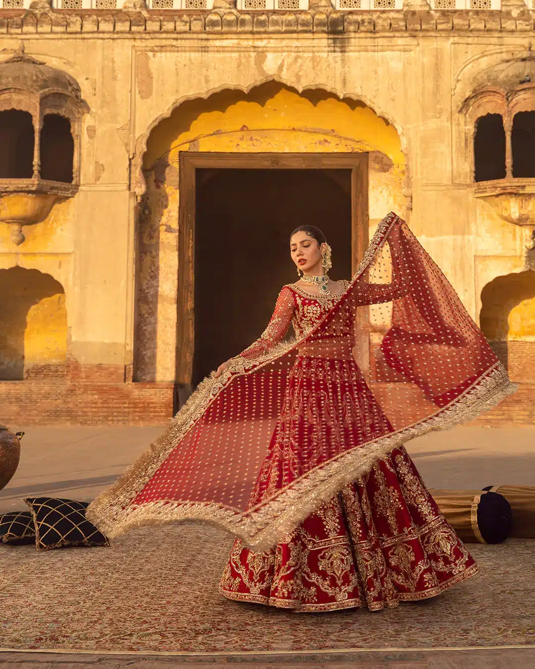luxurious red canvas of fine spun raw silk bridal dress